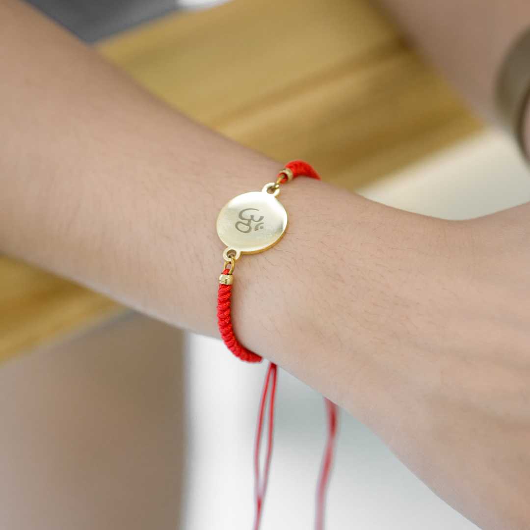 Round Stainless Steel Red String Bracelet When Worn - MyMantra